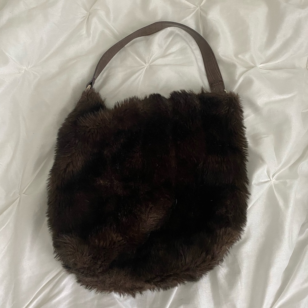 Fluffy brown hobo bag.